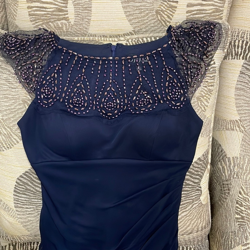 Midnight blue dress with beading on the neck area